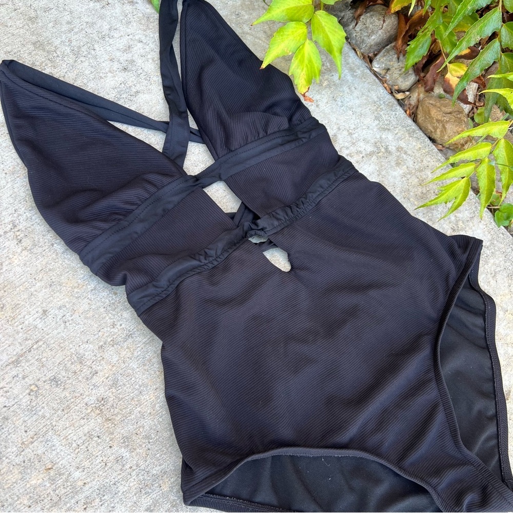Woman’s Black One Piece Swim Suit
